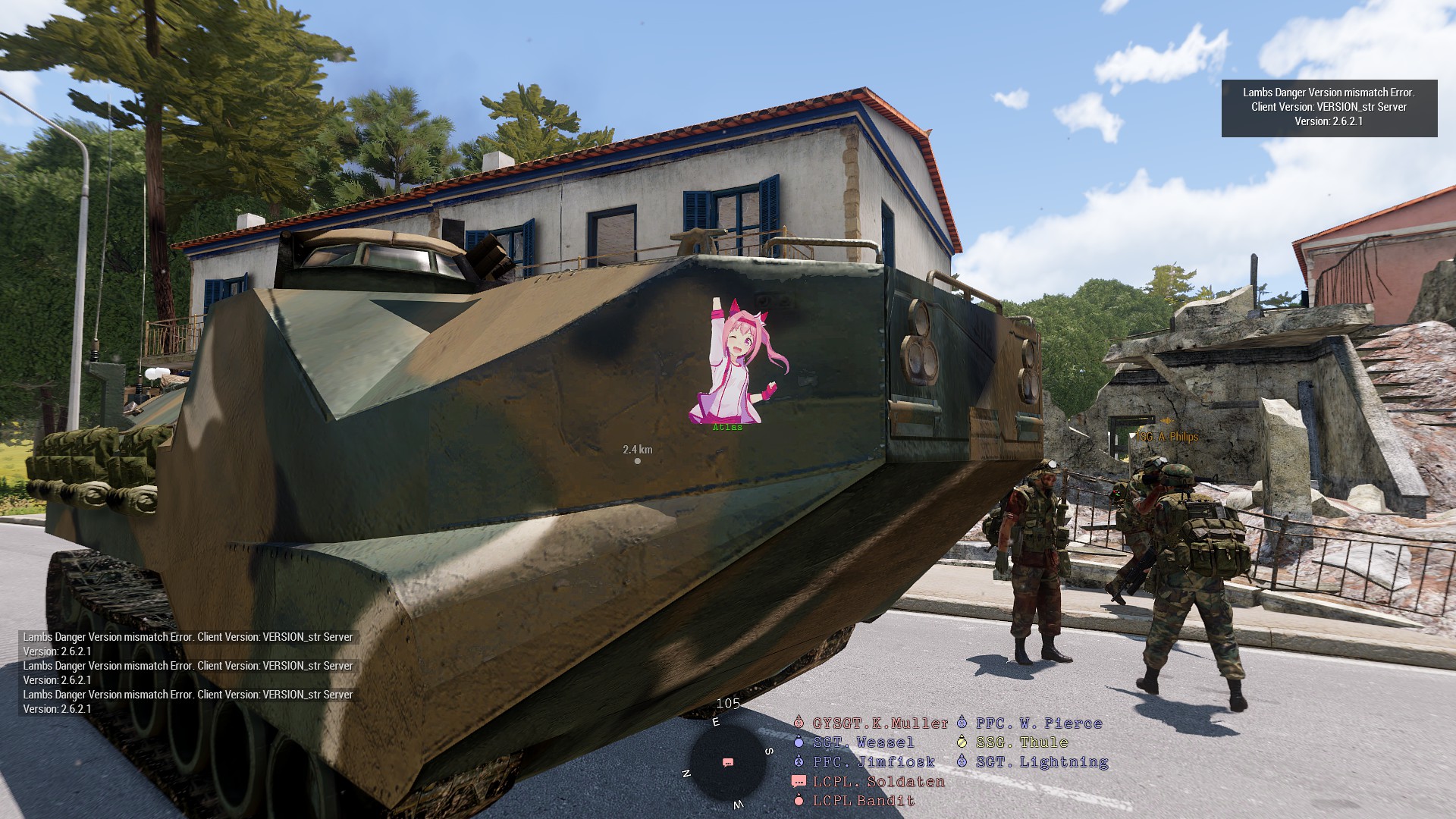 An armoured vehicle moving through a town