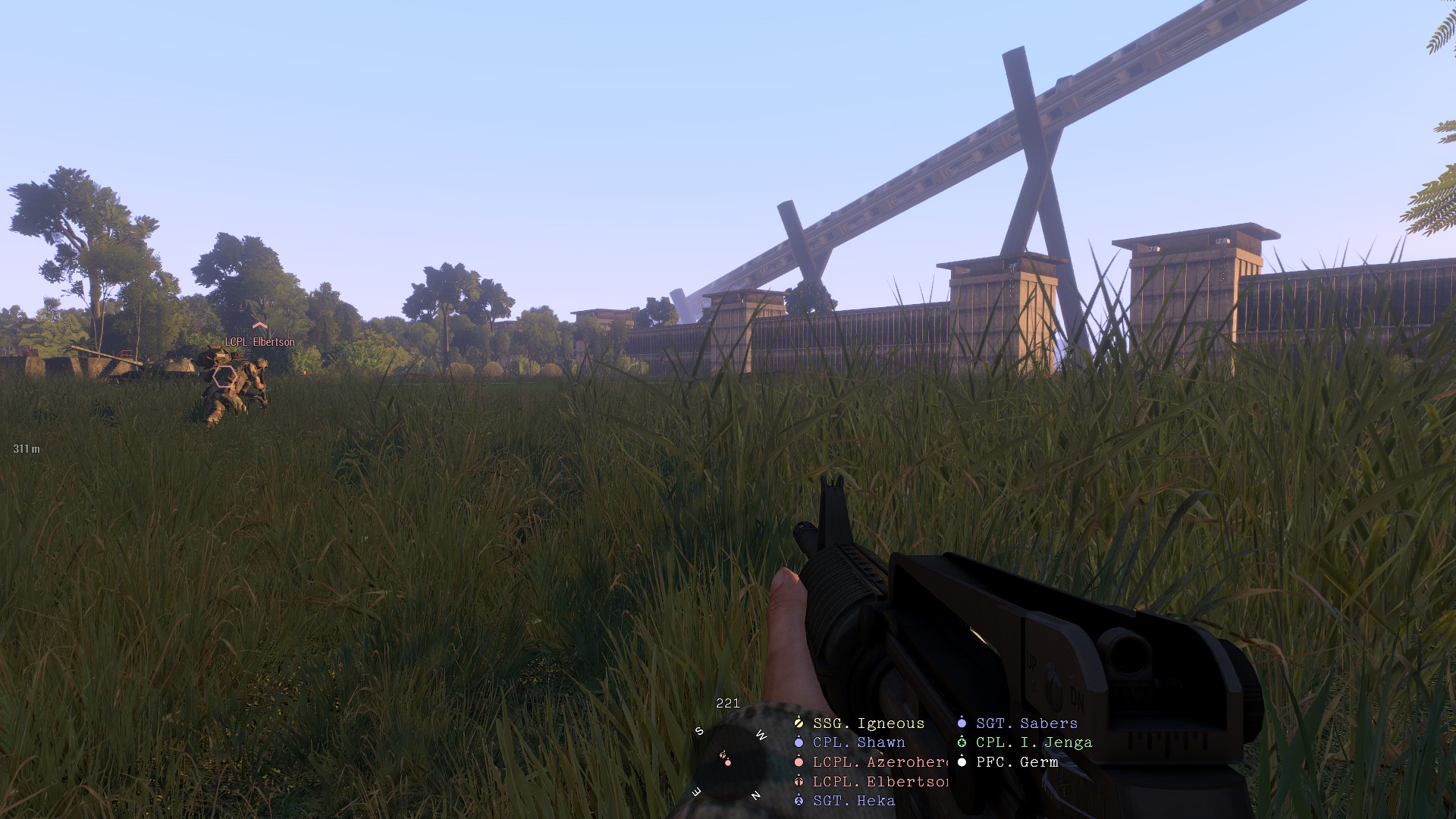 A patrol moving through a field